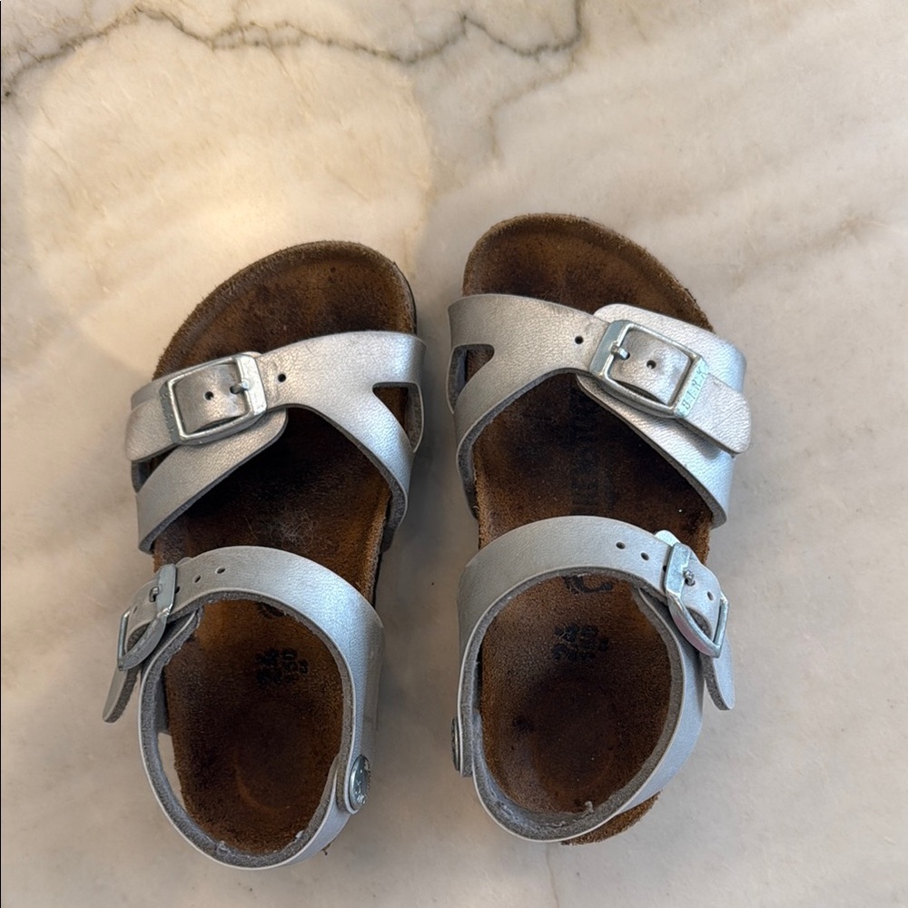 Birkenstock Silver Sandals with Adjustable Straps and Cork Footbed